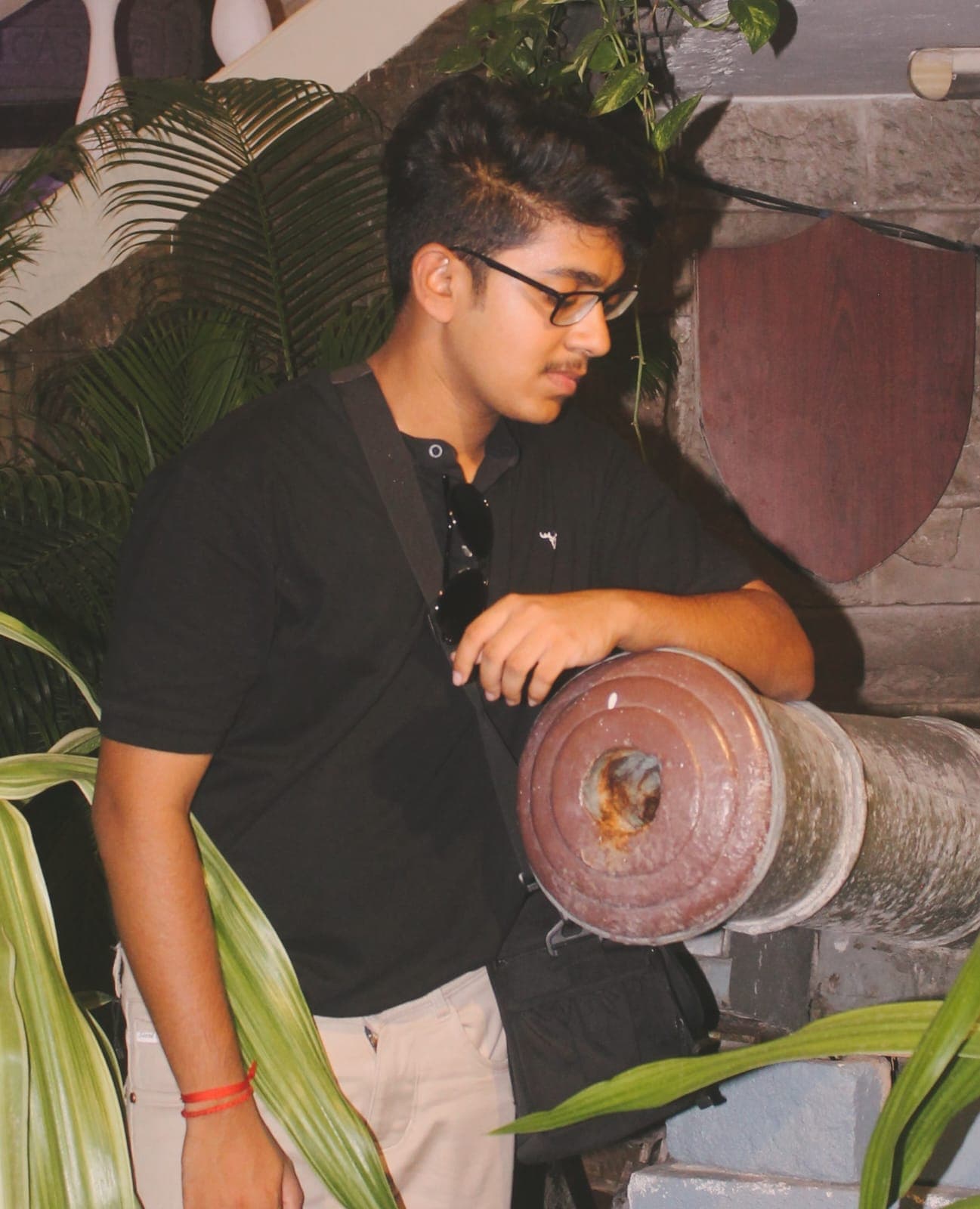 Sreedev Krishna in a patterned shirt looking to the side.